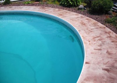 stamped concrete pool patio surrounds